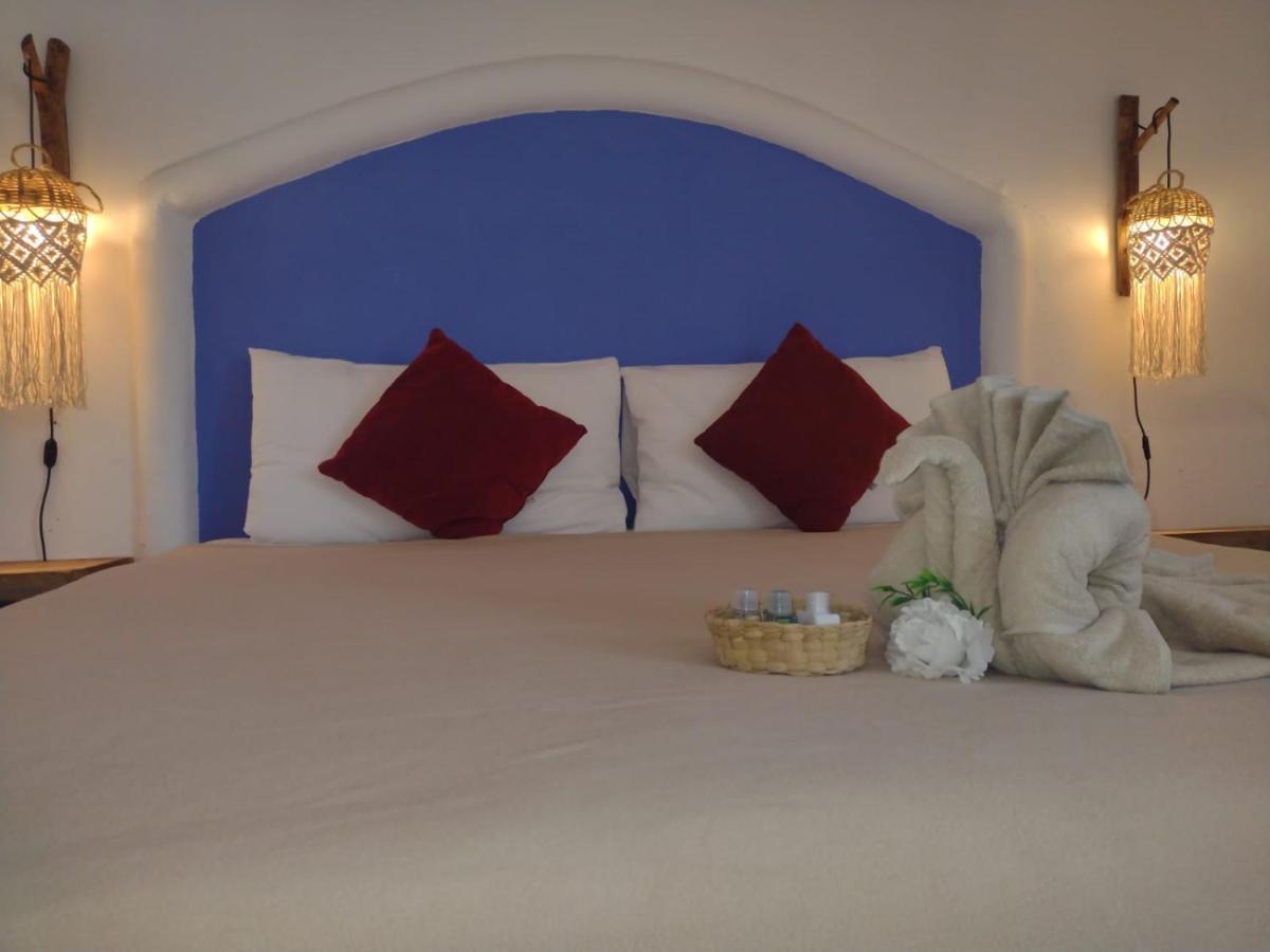 Mio Tulum Hotel Boutique Dış mekan fotoğraf A bedroom at the hotel