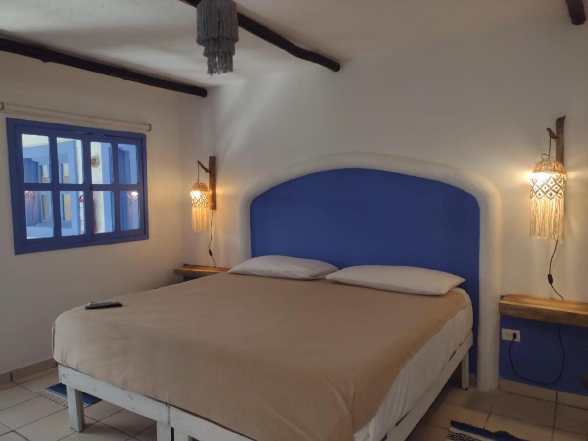 Mio Tulum Hotel Boutique Dış mekan fotoğraf A bedroom in a hotel in Tunisia
