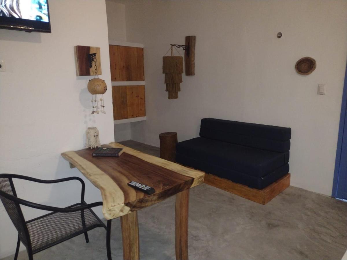 Mio Tulum Hotel Boutique Dış mekan fotoğraf A living room in a hotel in Greece