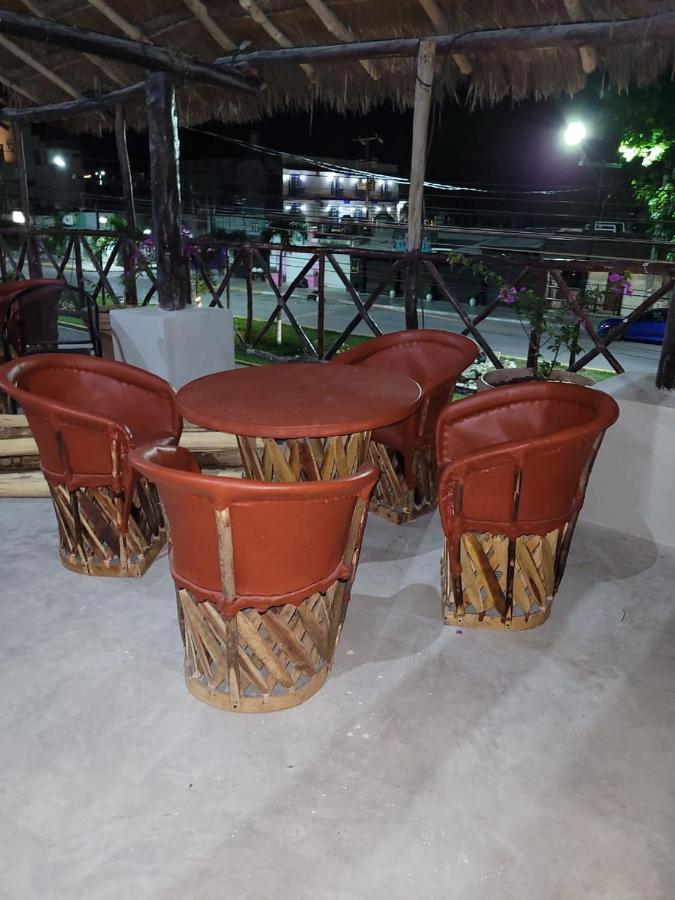 Mio Tulum Hotel Boutique Dış mekan fotoğraf A set of equipales