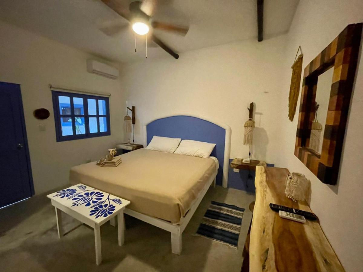 Mio Tulum Hotel Boutique Dış mekan fotoğraf A bedroom in a hotel in San Cristóbal de Las Casas, Chiapas, Mexico